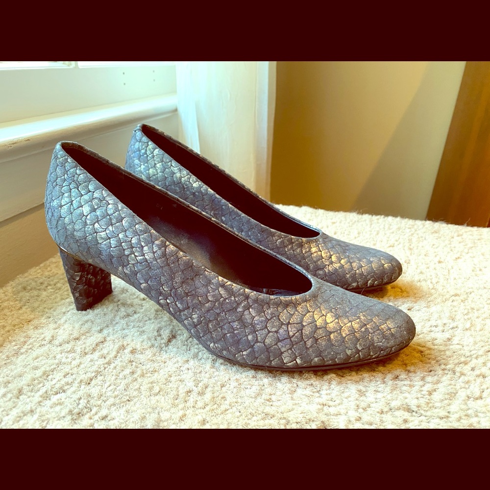 Silver pumps.